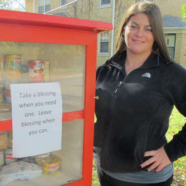 Maggie Ballard of Wichita, Kan., and her "blessing box" filled with food and personal care items that she and others have donated.